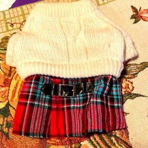 sweater and green and red pleated skirt